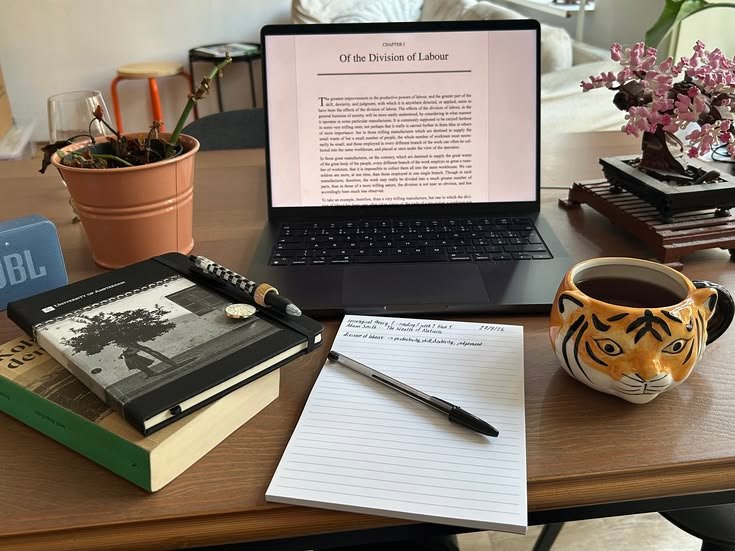 A warm, journal-inspired desk scene from Cadrill