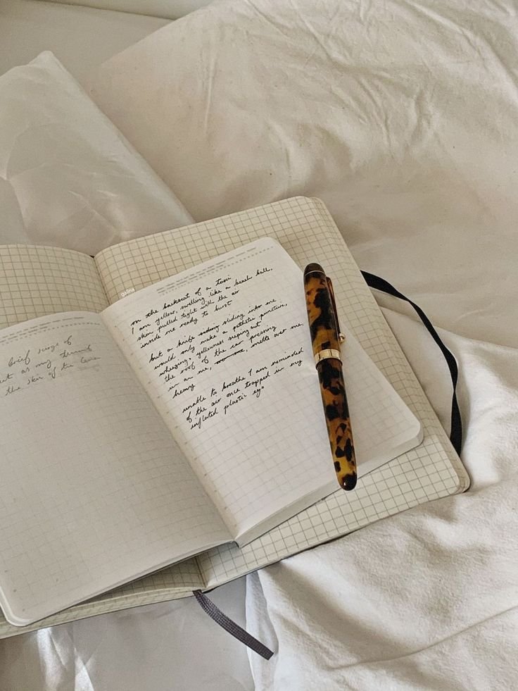Journal and pen on a desk
